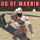 A crappy title screen shows Kratos standing in a big, sandy arena.